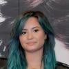 Demi Lovato, les cheveux bleus, lors d'une conférence de presse pour promouvoir son nouvel album à Mexico, le 11 octobre 2013.