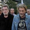 Eddy Mitchell et Johnny Hallyday sur le tournage de "Salaud, on t'aime" à Saint-Gervais-les-Bains le 31 juillet 2013.