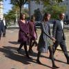 Barack et Michelle Obama avec leurs filles Sasha et Malia le 27 octobre 2013 à Washington, en route pour la messe.