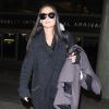 Demi Moore arrive à l'aéroport LAX de Los Angeles après son voyage en Inde, le 3 novembre 2013.