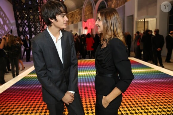 Alain-Fabien Delon et Clotilde Courau au vernissage de l'exposition Miss Dior qui s'est tenu au Grand Palais le 12 novembre 2013