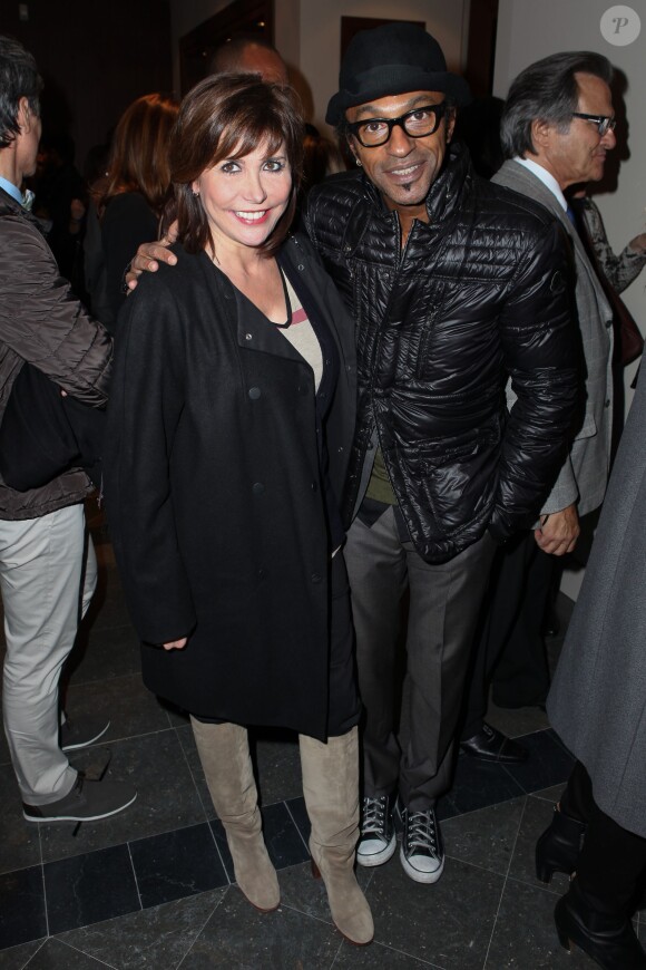 Liane Foly et Manu Katché assistent à la soirée d'inauguration de la boutique Massimo Dutti, située au 18-20 rue de la Paix dans le 2e arrondissement de Paris. Le 14 novembre 2013.