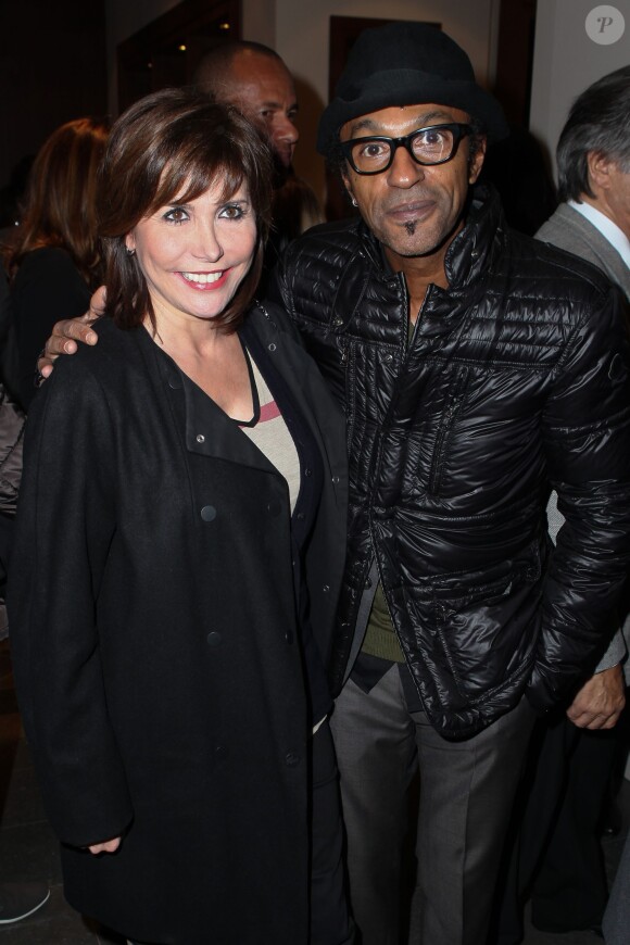 Liane Foly et Manu Katché assistent à la soirée d'inauguration de la boutique Massimo Dutti, située au 18-20 rue de la Paix dans le 2e arrondissement de Paris. Le 14 novembre 2013.