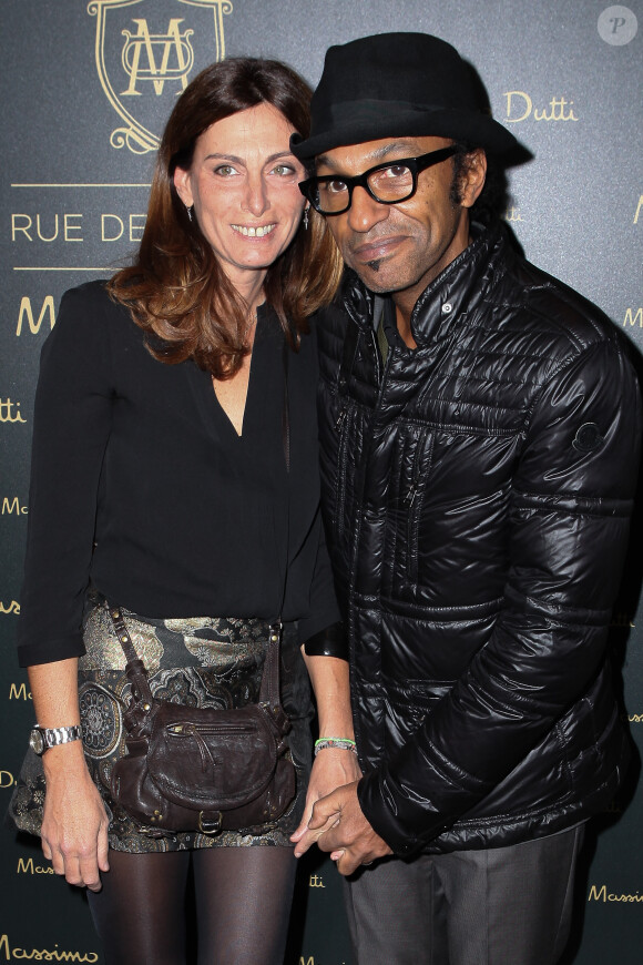 Manu Katché et sa femme Laurence assistent la soirée d'inauguration de la boutique Massimo Dutti, située au 18-20 rue de la Paix dans le 2e arrondissement de Paris. Le 14 novembre 2013.