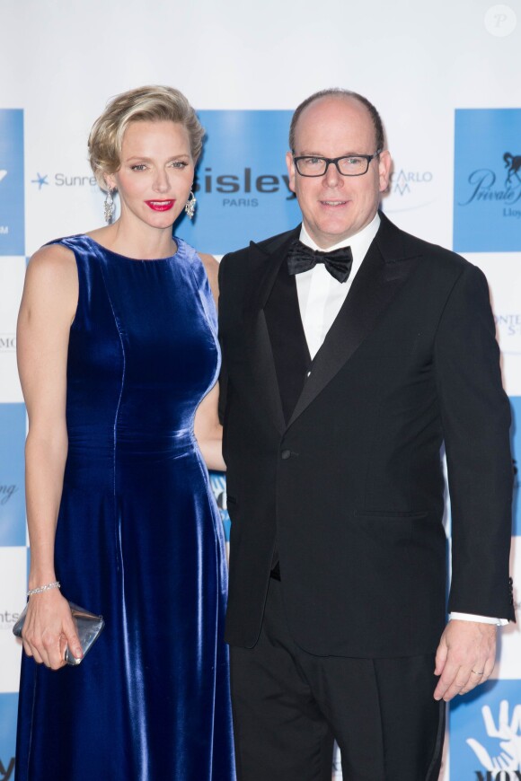 La princesse Charlene de Monaco et son mari le prince Albert II de Monaco au Diner de gala annuel de charité MONAA (Monaco Against Autism) au Sporting Club de Monaco. Le 15 Novembre 2013.