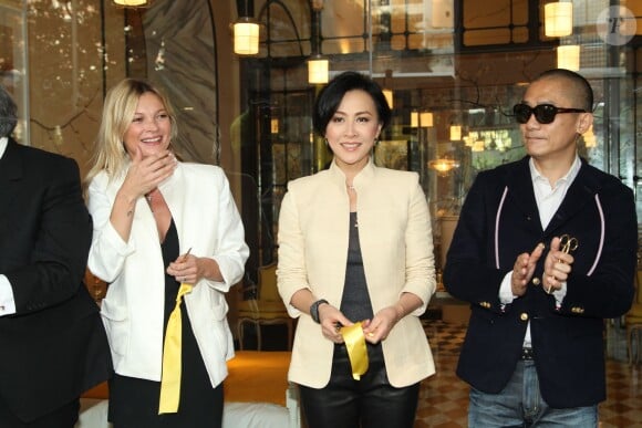 Kate Moss, Carina Lau et Tony Leung Chiu Wai inaugurent le magasin Tang Tang Tang Tang à Hong Kong. Le 16 novembre 2013.