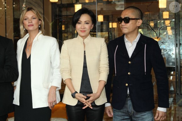Kate Moss, Carina Lau et Tony Leung Chiu Wai célèbrent l'inauguration du magasin Tang Tang Tang Tang à Hong Kong. Le 16 novembre 2013.