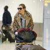 Kate Moss arrive à l'aéroport d'Heathrow. Londres, le 17 novembre 2013.