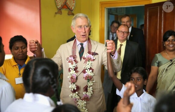 The Prince of Wales takes part in the 'Hokey Cokey' with disabled children as he visits MEDCAFEP Day School in Kandy as his visit to Sri Lanka continues on November 16, 2013. Photo by Chris Jackson/PA Wire/ABACAPRESS.COM16/11/2013 - Nuwara Eliya