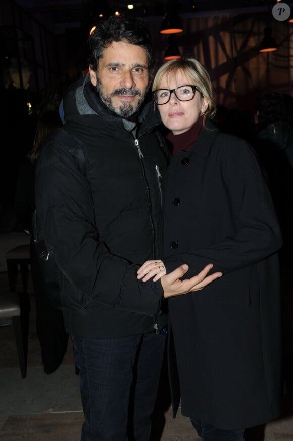 Exclusif : Karin Viard et Pascal Elbé à la soirée Sushi Shop organisée au Minipalais à Paris, le 19 novembre 2013.