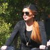 Lindsay Lohan et sa mère Dina se promènent à vélo dans les rues de New York. Le 8 octobre 2013.