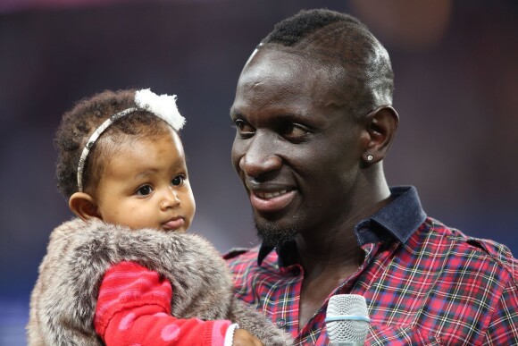 Mamadou Sakho et sa fille Aida au Parc des Princes le 22 septembre 2013.