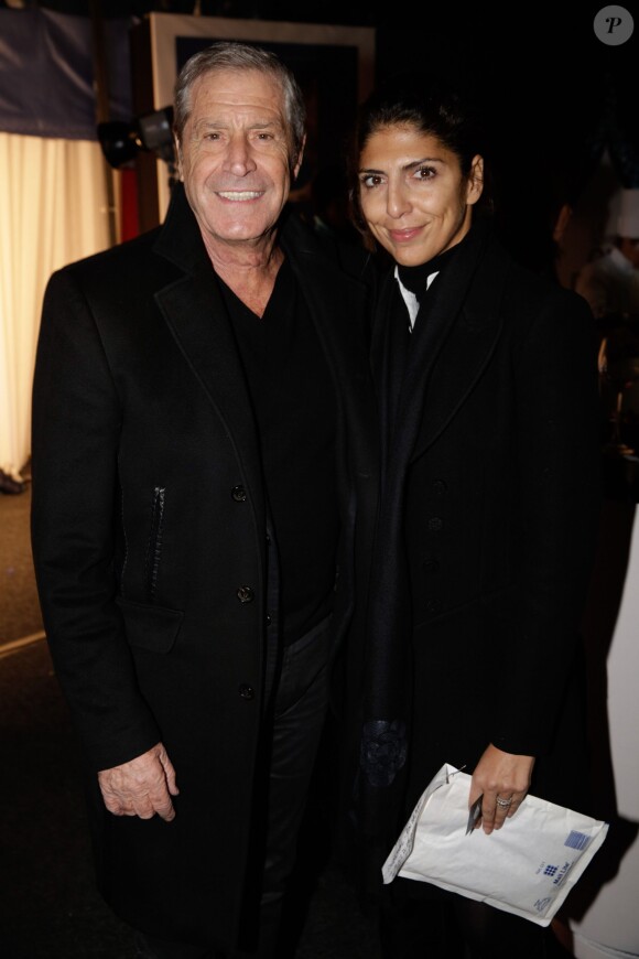 Jean-Claude Darmon et sa femme Hoda aà la soirée One Drop Party pour le 'Cirque du Soleil' à Boulogne-Billancourt, le 28 novembre 2013.