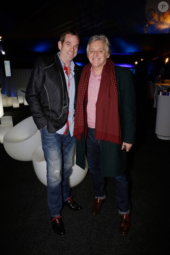 Garou et Gilbert Rozon à la soirée One Drop Party pour le 'Cirque du Soleil' à Boulogne-Billancourt, le 28 novembre 2013.