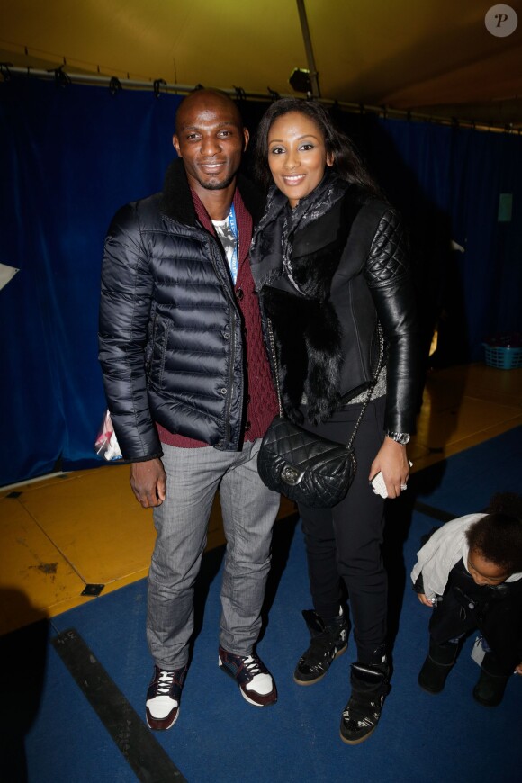 Zoumana Camara et sa femme à la soirée One Drop Party pour le 'Cirque du Soleil' à Boulogne-Billancourt, le 28 novembre 2013.