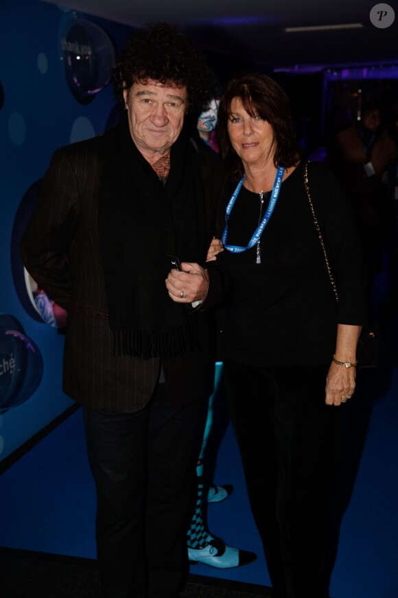 Robert Charlebois et sa femme à la soirée One Drop Party pour le 'Cirque du Soleil' à Boulogne-Billancourt, le 28 novembre 2013.