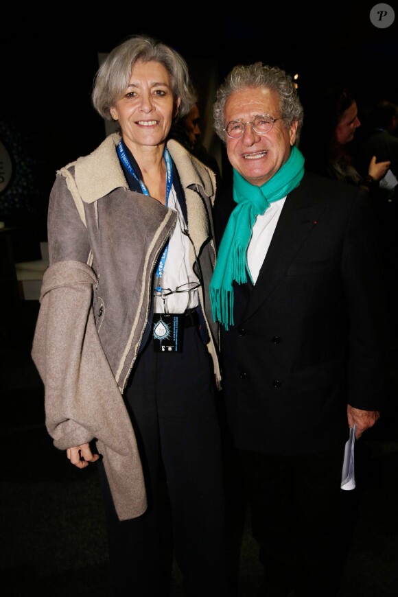 Claudie Haignere et Laurent Dassault à la soirée One Drop Party pour le 'Cirque du Soleil' à Boulogne-Billancourt, le 28 novembre 2013.
