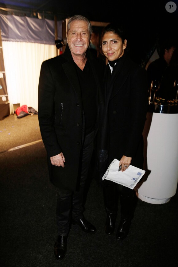 Jean-Claude Darmon et sa femme Hoda à la soirée One Drop Party pour le 'Cirque du Soleil' à Boulogne-Billancourt, le 28 novembre 2013.