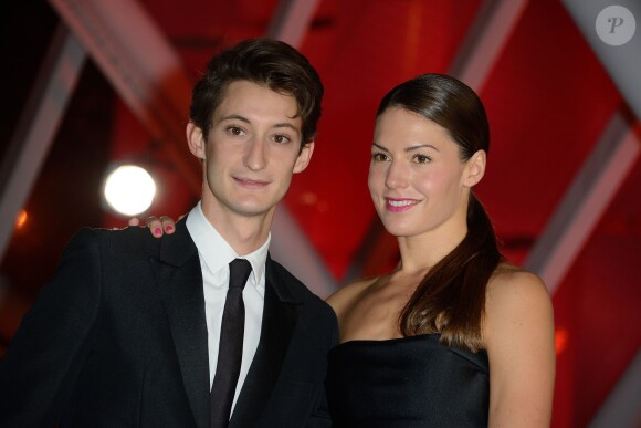 Pierre Niney et Natasha Andrews lors de la cérémonie d'ouverture du 13e Festival international du film de Marrakech, le 29 novembre 2013.