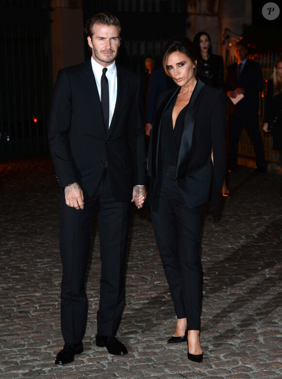 David Beckham, ultrachic en costume Burberry, assiste avec son épouse Victoria à la soirée du Green Carpet Challenge par la fondation The Global Fund. Londres, le 16 septembre 2013.