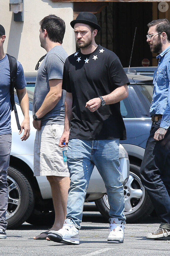 Justin Timberlake à Los Angeles, porte un t-shirt Givenchy et des baskets Nike Air Jordan. Le 30 juin 2013.