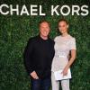 Michael Kors, Bar Refaeli arrivent à l'ouverture de la boutique Michael Kors à Milan le 4 décembre 2013