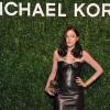 Eleonora Carisi arrive à l'ouverture de la boutique Michael Kors à Milan le 4 décembre 2013
