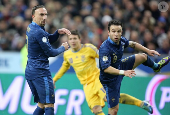Franck Ribéry et Mathieu Valbuena lors de la qualification pour la prochaine Coupe du Monde au Brésil en battant l'Ukraine 3- 0 au Stade de France le 19 novembre 2013.