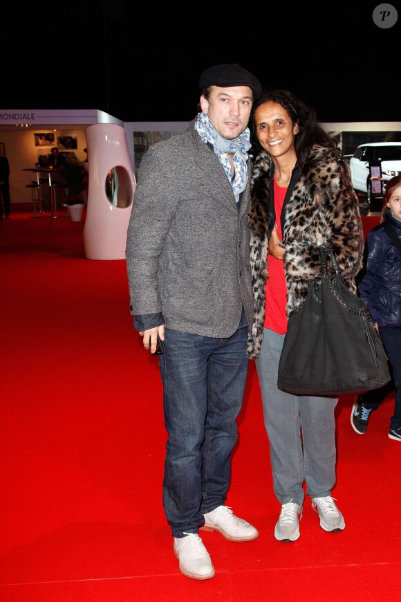 Vincent Perez et sa femme Karine Silla lors de l'épreuve Style & Competition for AMADE aux Gucci Masters de Villepinte le 7 décembre 2013