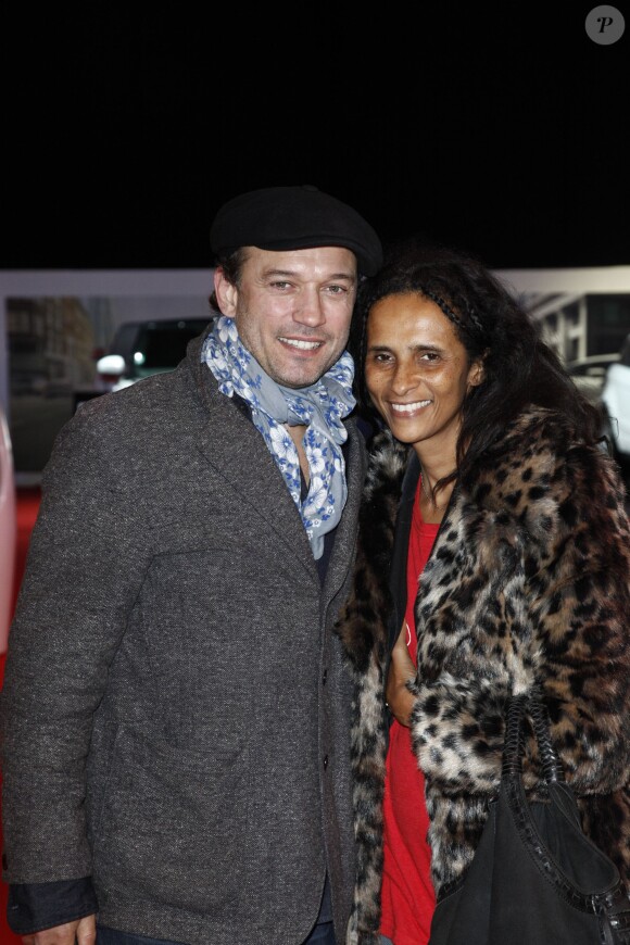Vincent Perez et sa femme Karine Silla lors de l'épreuve Style & Competition for AMADE aux Gucci Masters de Villepinte le 7 décembre 2013