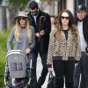 Petra et Tamara Ecclestone dans les rues de Beverly Hills, le 7 décembre 2013, en compagnie de la petite Lavinia et de Jay Rutland et James Stunt