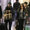 Tamara Ecclestone, son mari Jay Rutland et leur petit chien débarquent à Los Angeles, le 5 décembre 2013