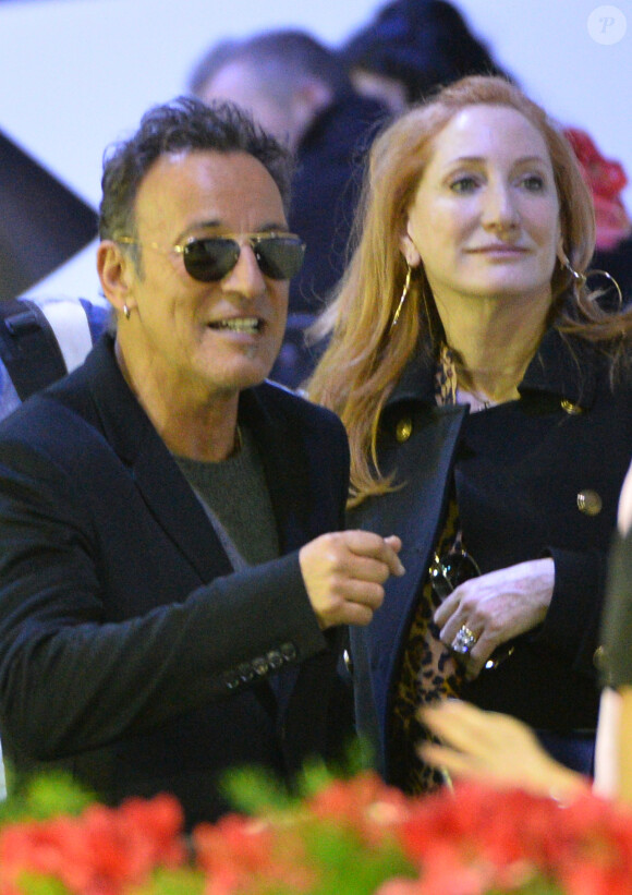 Bruce Springsteen et sa femme Patti Scialfa, duo complice lors de la dernière journée du Gucci Paris Masters 2013 à Villepinte, le 8 décembre 2013