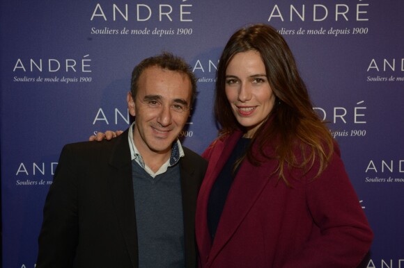 Elie Semoun et Zoé Felix à l'inauguration de la nouvelle boutique "André" à Paris, le 10 décembre 2013.