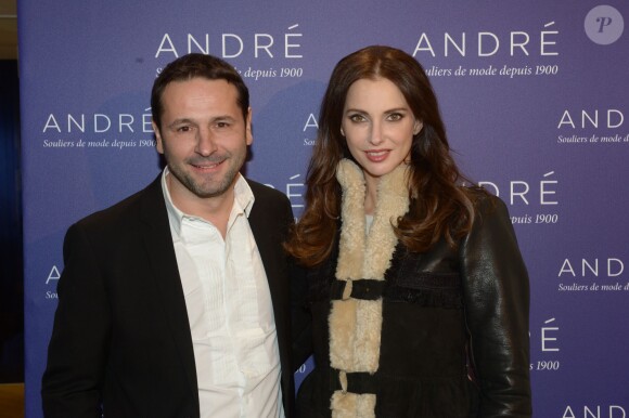 Lionel Giraud (président d'André) et Frédérique Bel à l'inauguration de la nouvelle boutique "André" à Paris, le 10 décembre 2013.