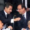 Nicolas Sarkozy et François Hollande au stade de Soccer City à Soweto, le 10 decembre 2013, lors de l'hommage à Nelson Mandela.