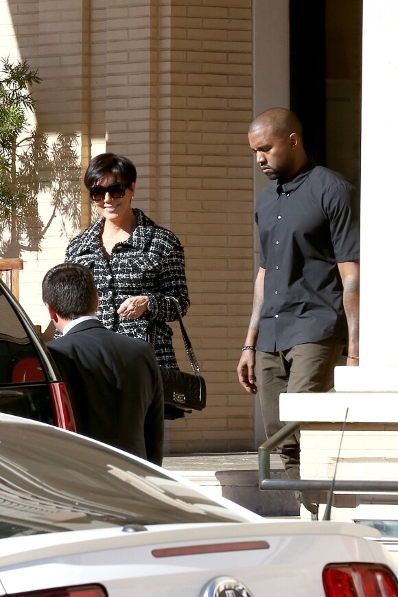 Kim Kardashian, Kanye West and Kris Jenner, after attending the 2013 Hollywood Reporter Women in Entertainment breakfast this morning, get in some retail therapy at Barneys New York and Chanel in Beverly Hills, Los Angeles, CA, USA on December 11, 2013. Kim stood out in a gold satin dress with a matching coat while her mom and beau were dressed in black. Photo by GSI/ABACAPRESS.COM12/12/2013 - Los Angeles