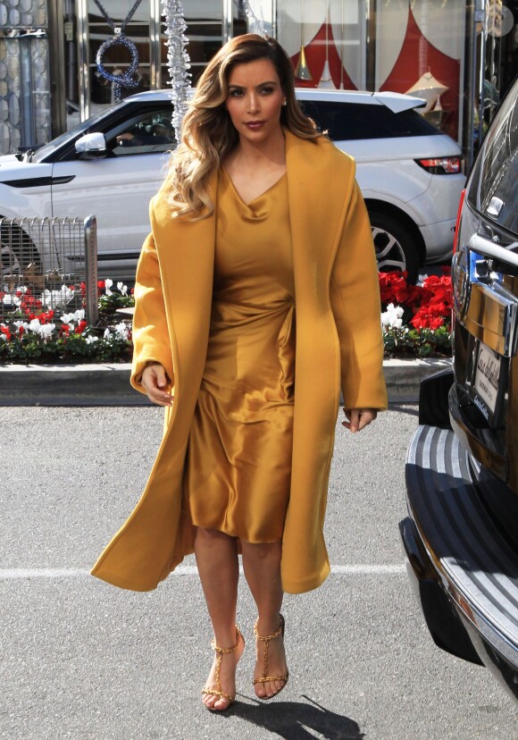 Kim Kardashian se rend à la boutique Chanel avec Kanye West et sa mère Kris Jenner. Beverly Hills, le 11 décembre 2013.