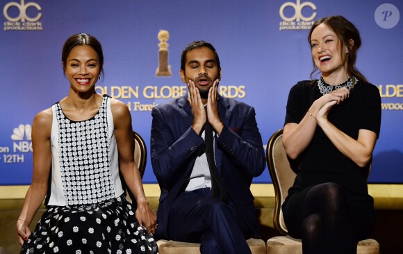Zoe Saldana, Aziz Ansari et Olivia Wilde enceinte lors de l'annonce des nominations des Golden Globes au Beverly Hilton Hotel de Beverly Hills, le 12 décembre 2013.