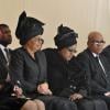 Winnie Mandela, ex-epouse de l'ancien president sud-africain Nelson Mandela, Graça Machel, veuve de Mandela lors de ses funérailles à Qunu en Afrique du Sud le 15 décembre 2013.