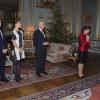 A cinq jours de son 70e anniversaire, la reine Silvia de Suède recevait les félicitations de différents corps de l'Etat lors d'une réception au palais royal à Stockholm le 18 décembre 2013, en présence de son époux le roi Carl XVI Gustaf de Suède, de leur fille la princesse Victoria avec le prince Daniel et de leur fils le prince Carl Philip.