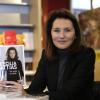 Cécilia Attias présente son livre Une Envie de Vérité lors d'une séance de dédicaces à la librairie Filigrannes, à Bruxelles, en Belgique, le 6 décembre 2013.
