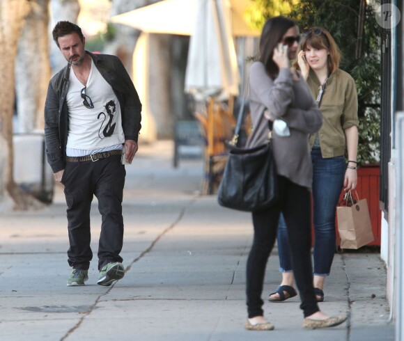 Exclusif - David Arquette et sa girlfriend Christina McLarty, enceinte, font du shopping à West Hollywood, le 23 décembre 2013.