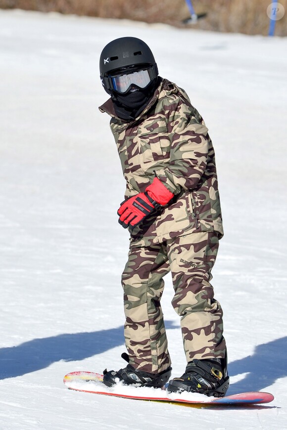 Henry, fils aîné de Seal, prend des courses de snowboard à Mammoth. Le 30 décembre 2013.