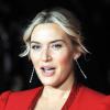 Kate Winslet, ici à Londres le 14 octobre 2013, a tenu à réagir aux critiques faites après la naissance de son 3e enfant.
