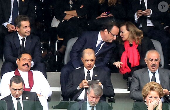 François Hollande et Valérie Trierweiler à la cérémonie d'hommage officielle à Nelson Mandela à Soweto, le 10 décembre 2013.