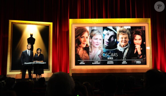 Chris Hemsworth et la présidente de l'Académique Cheryl Boone Isaacs annoncent les nominées aux Oscars 2014 à Beverly Hills, Los Angeles, le 16 janvier 2014.