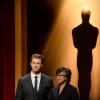 Chris Hemsworth et Cheryl Boone Isaacs aux nominations des Oscars 2014 à Beverly Hills, Los Angeles, le 16 janvier 2014.