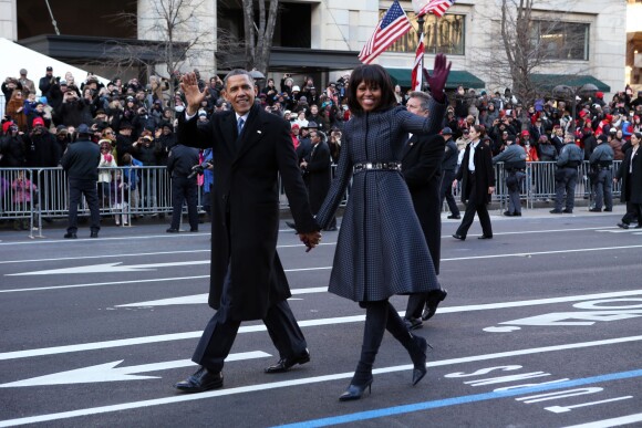 Barack et Michelle Obama défilent lors de la cérémonie d'investiture du président à Washington. Le 21 janvier 2013.