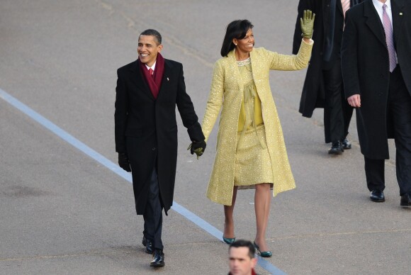 Barack et Michelle Obama défilent lors de la cérémonie d'investiture du président à Washington. Janvier 2009.